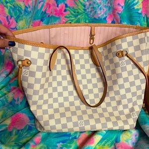 Louis Vuitton never full with wristlet